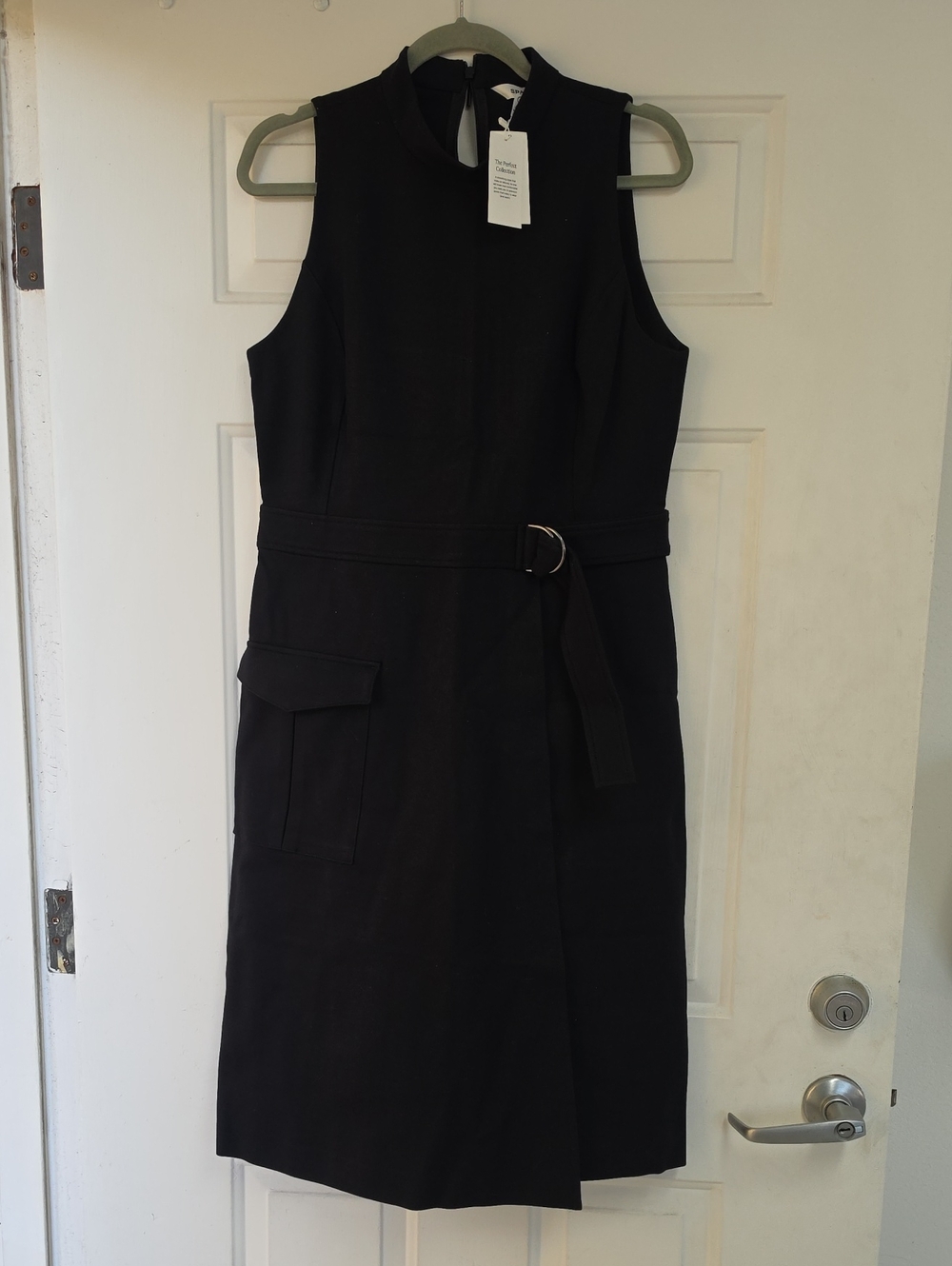 Spanx Sleeveless Ponte Cargo Dress featuring a faux-wrap skirt and a d-ring belt - Picture 2 of 9